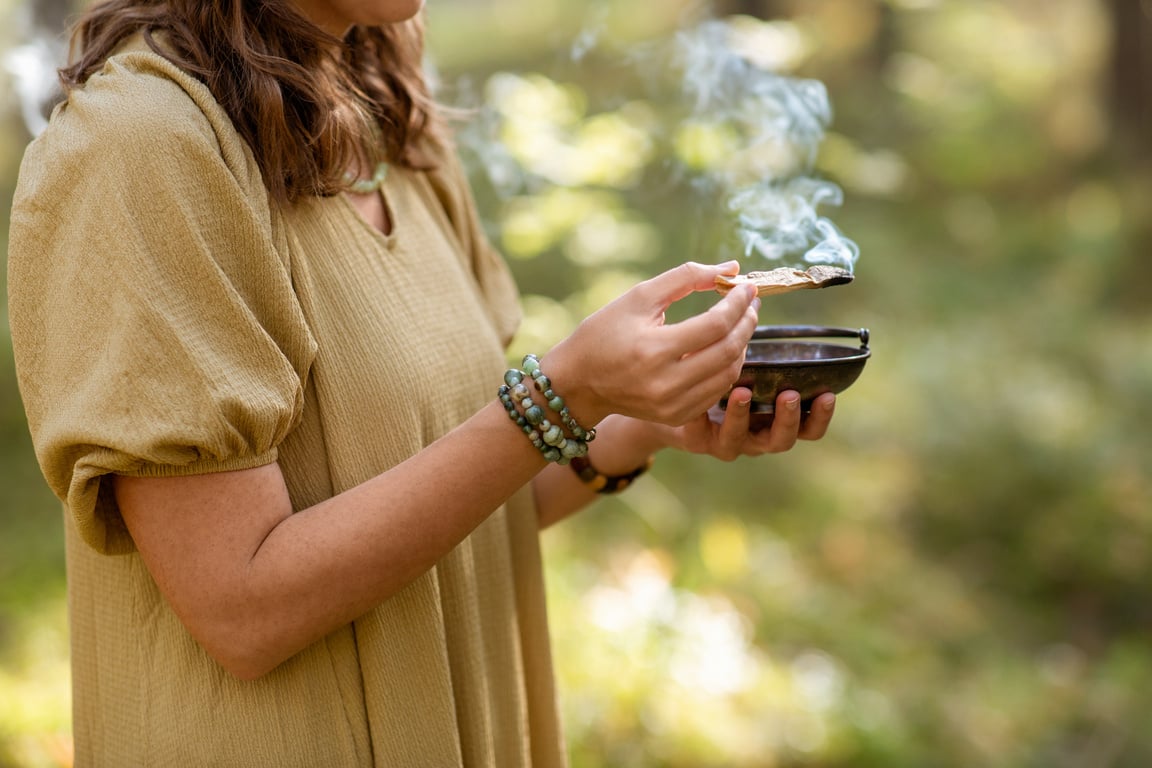 Woman with Palo Santo Performing Magic Ritual